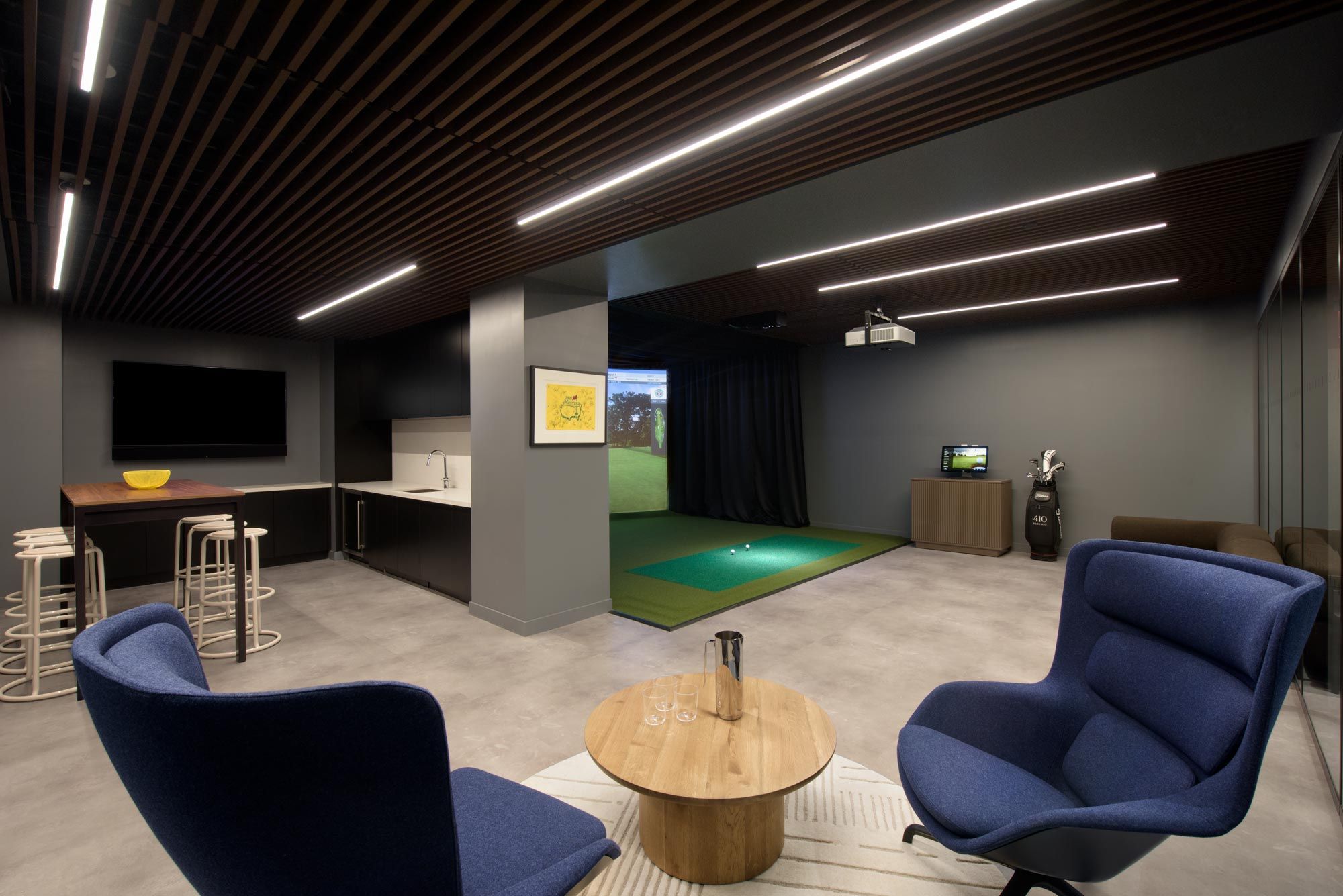 410 Park Avenue’s indoor golf simulator and a private lounge