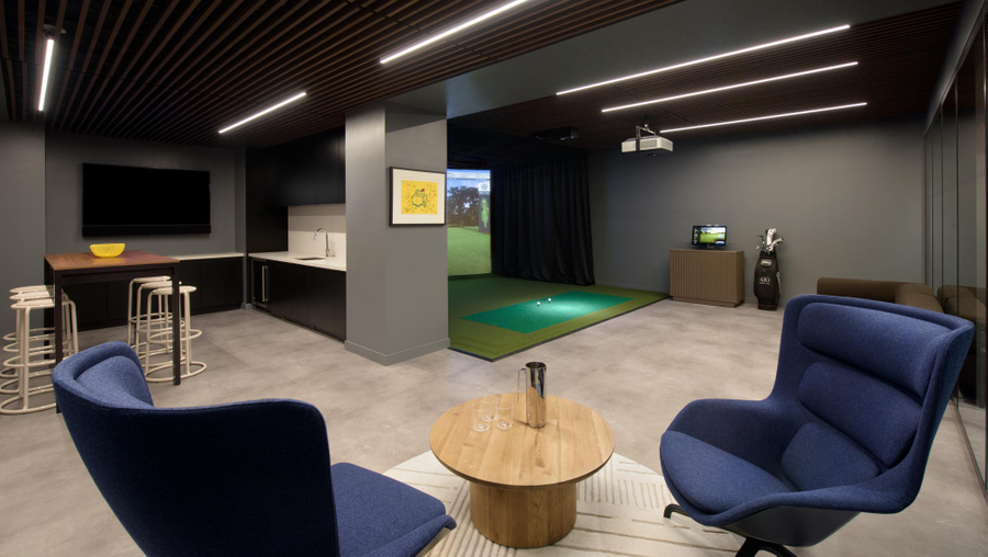 410 Park Avenue’s indoor golf simulator and a private lounge 2
